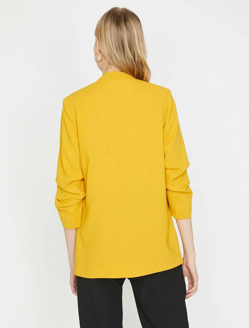 10627 Mustard Collarless Jacket