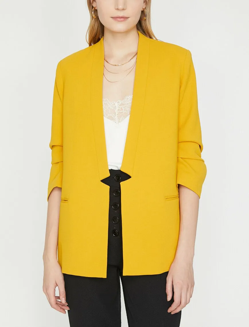 10627 Mustard Collarless Jacket
