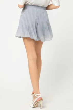 Polka dot pleated flared shorts